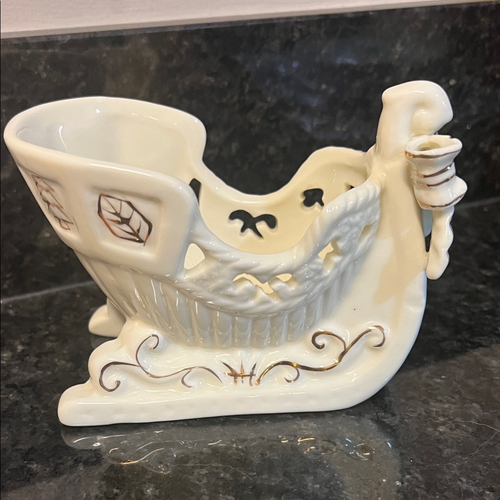 Charming Cream Ceramic Sleigh with Bow